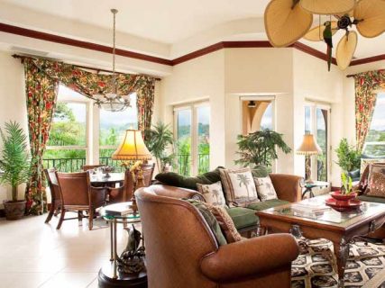 Brown leather chair in Bella Vista living room